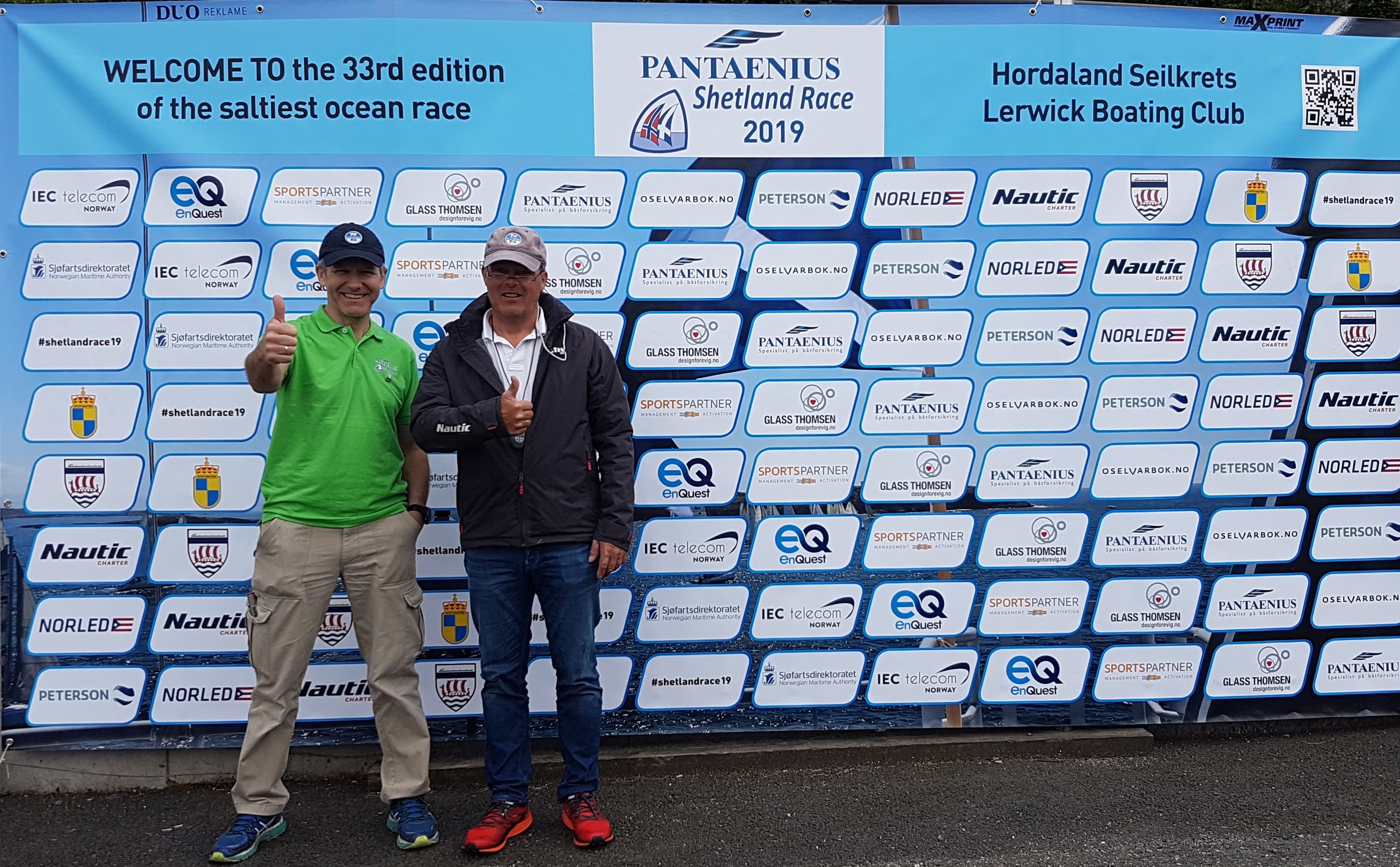 Race Officer and Committee Chairman greeting the sailors