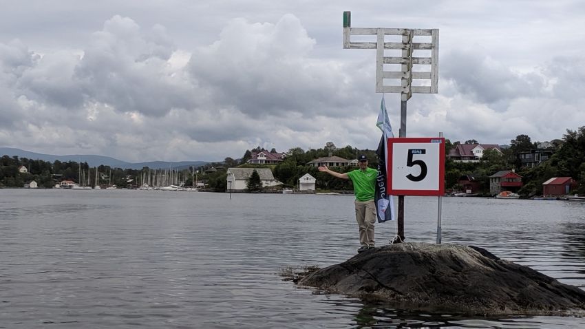 Race Officer showing the way to Race Office